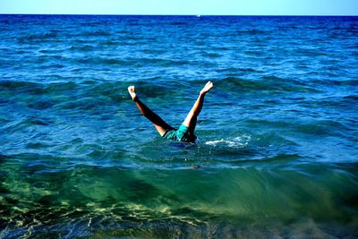 Scenic view of sea against blue sky