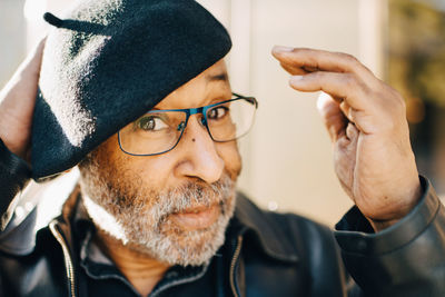 Portrait of senior man with flat cap