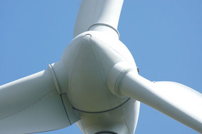 Low angle view of airplane against clear sky