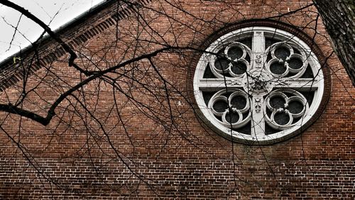 Low angle view of brick wall