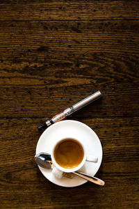 Directly above shot of coffee cup on table