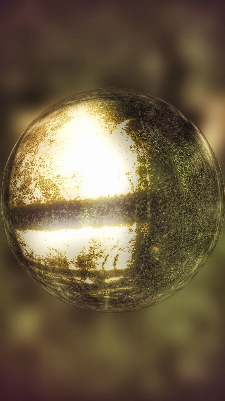 CLOSE-UP OF CRYSTAL BALL WITH REFLECTION