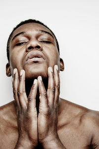 Portrait of young man, studio shot