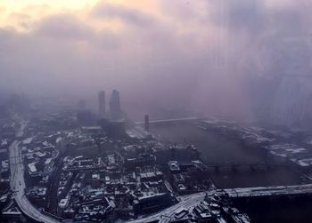 High angle view of buildings against sky in city