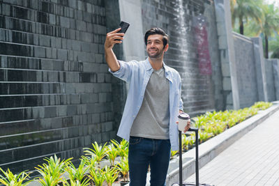 Young man using mobile phone