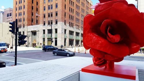 Red car on city street