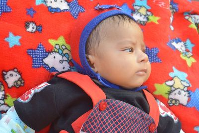 Portrait of cute boy looking away