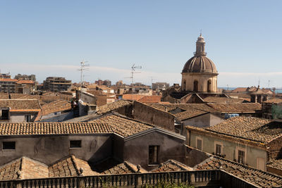 High angle view of buildings in city against sky