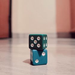 Close-up of dices on table