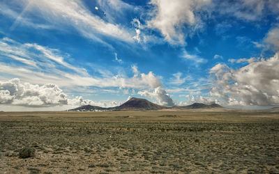 Scenic view of desert against sky