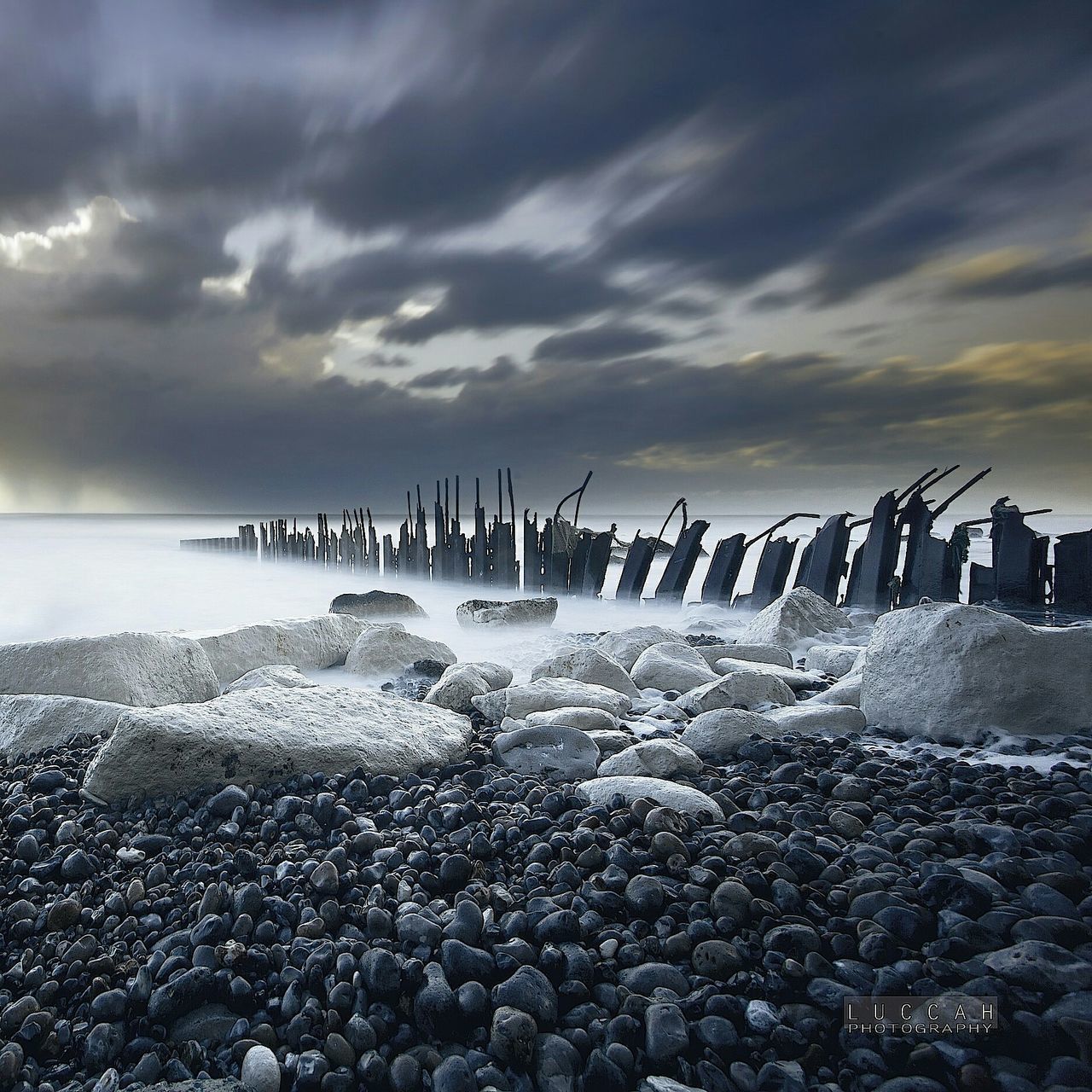 sea, sky, beach, water, cloud - sky, shore, horizon over water, cloudy, sand, nature, bird, scenics, rock - object, tranquil scene, tranquility, cloud, nautical vessel, beauty in nature, outdoors