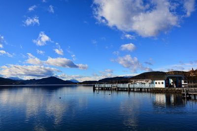 Scenic view of lake against blue sky