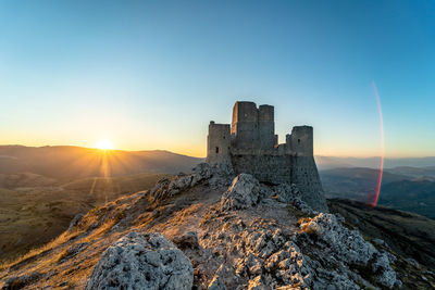 The wonderful rocca calascio castle at sunset in abruzzo, italy