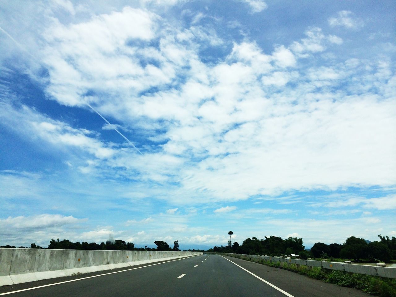 the way forward, transportation, road, diminishing perspective, road marking, vanishing point, sky, cloud - sky, country road, empty road, cloudy, empty, asphalt, highway, long, street, cloud, dividing line, nature, landscape