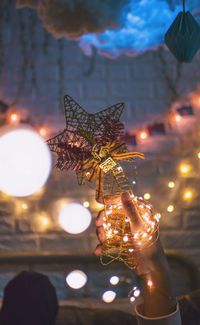 Close-up of illuminated christmas tree at night