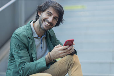 Young woman using mobile phone