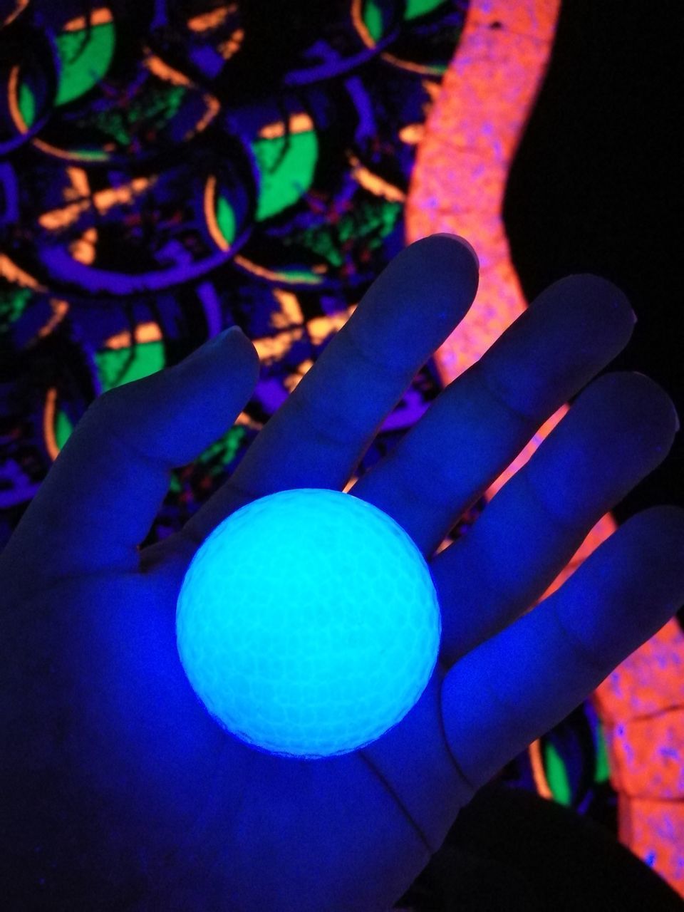 human hand, human body part, human finger, real people, blue, close-up, ball, celebration, one person, easter, outdoors, night, people