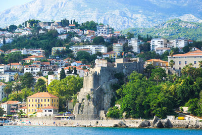 Herceg novi by mountains in sunny day