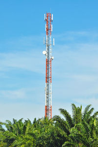 Close-up of tower against blue sky