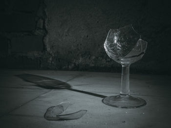 Close-up of wineglass on table