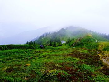 Mountain against sky during foggy weather