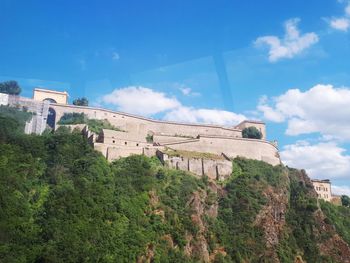 Low angle view of fort against sky