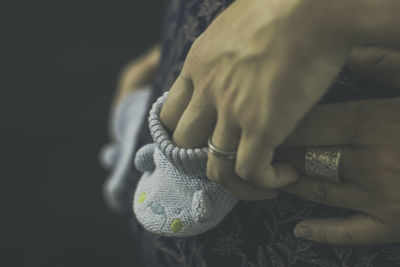 Close-up of woman holding hands