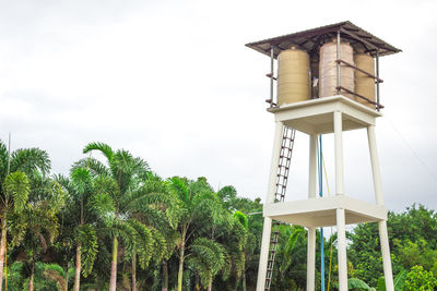 Low angle view of water tower against sky