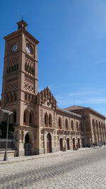 View of historic building against blue sky