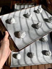 High angle view of hand holding ice cream