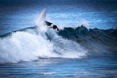 Man surfing on sea