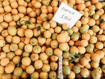 High angle view of pumpkins for sale at market stall