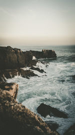 Scenic view of sea against clear sky