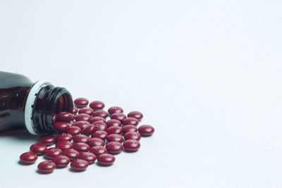 High angle view of cherries on white background