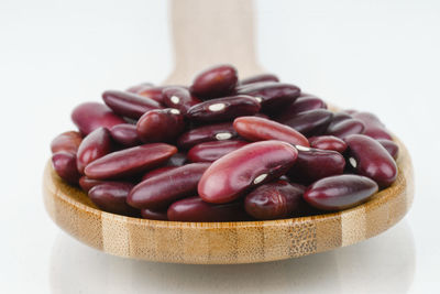 Close-up of roasted coffee beans in bowl