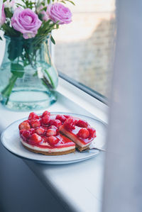 Close-up of strawberries in plate on table