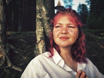 Portrait of woman in forest