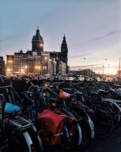 Buildings in city at sunset