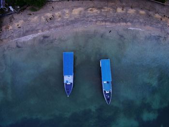 Reflection of boat in water