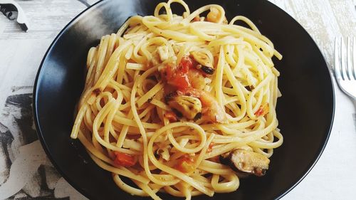 Close-up of pasta in plate on table