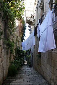 Clothes drying outside house