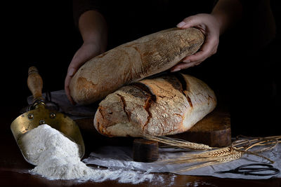 Close-up of person preparing food on table