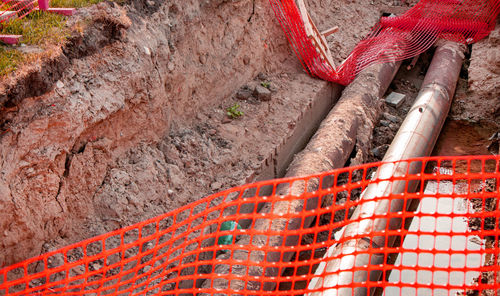 Repair of the heating plant system with the laying of new underground metal pipes in the trench