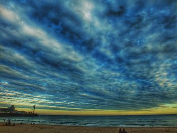 Scenic view of sea against sky at sunset