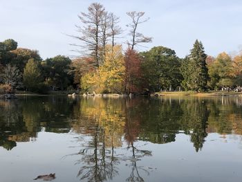 Scenic view of lake against sky during autumn