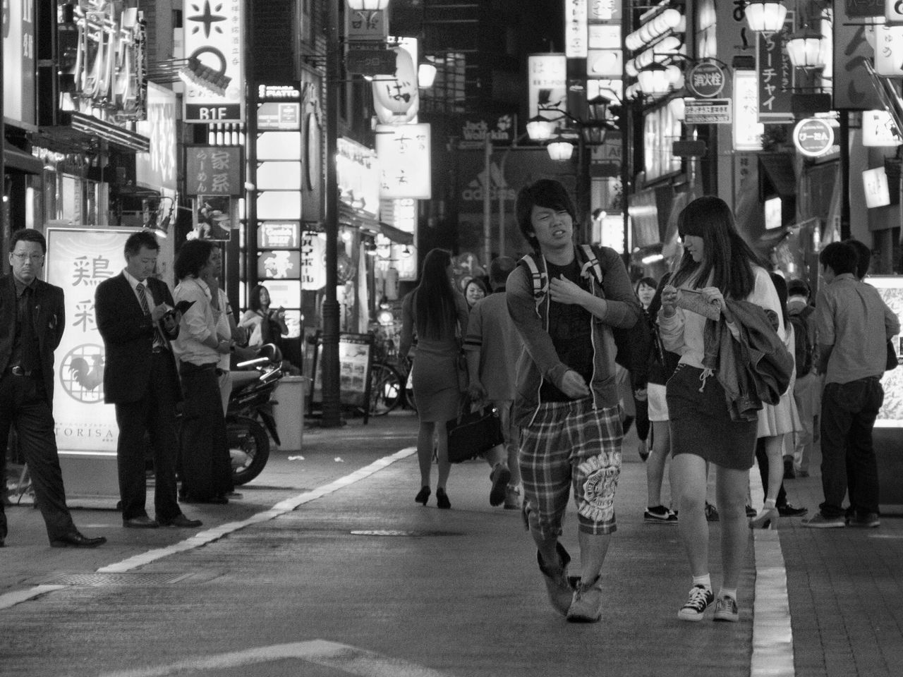 city, street, night, walking, illuminated, city life, full length, building exterior, outdoors, large group of people, group of people, real people, architecture, crowd, men, pedestrian, neon, people, adult, adults only