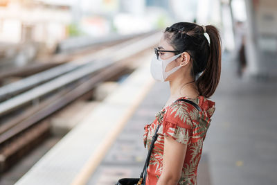 Side view of woman looking away