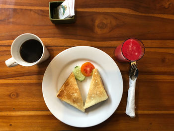 High angle view of breakfast served on table
