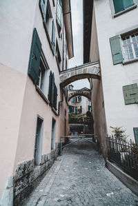 Staircase in city against sky