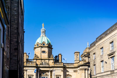 Bank of scotland against clear blue sky